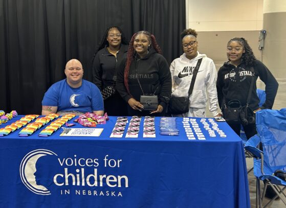 Group of individuals at booth